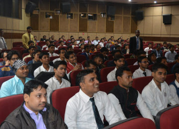 Packed auditorium during a seminar
